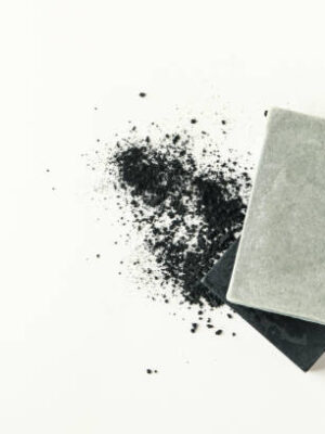 Pieces of natural handmade soap on white background